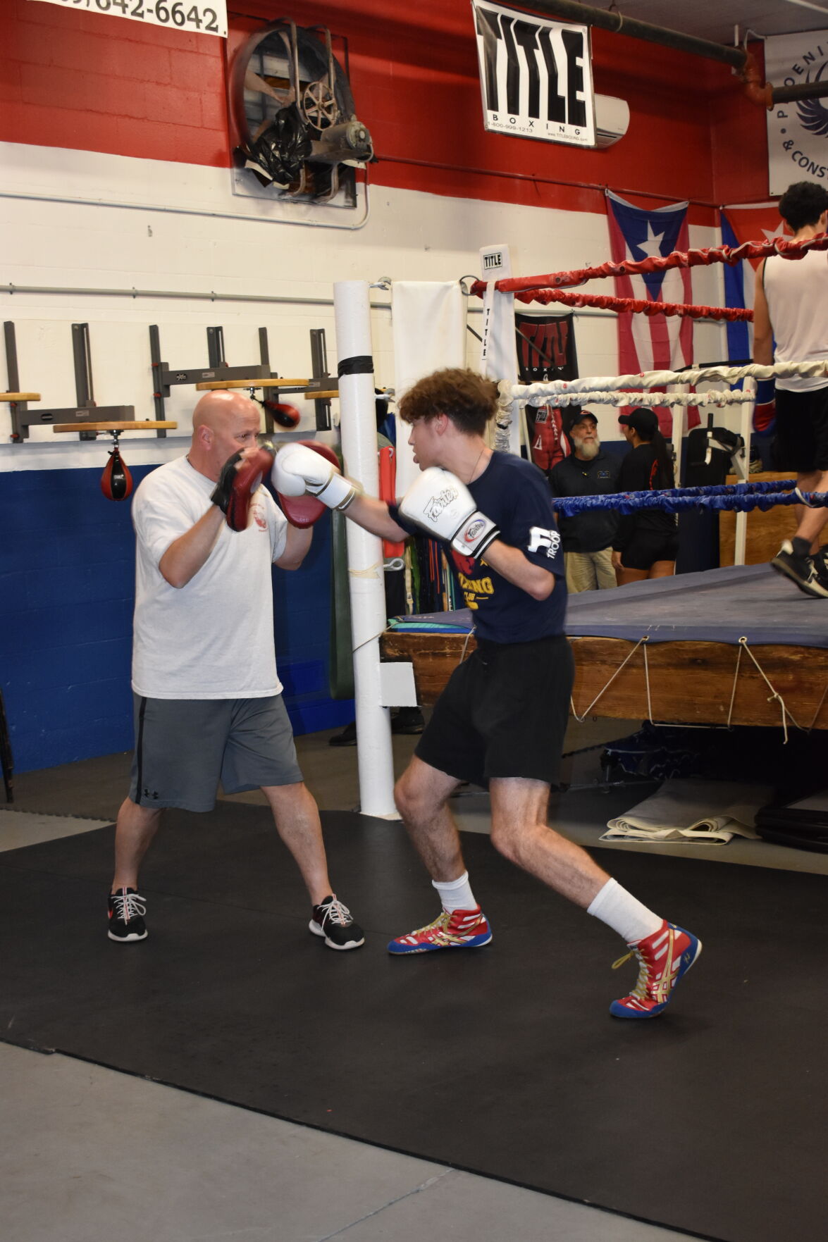 Kids Living Their Best 8. Calvin Sheeley works out with dad Jody, who used to run a gym in Connecticut..JPG